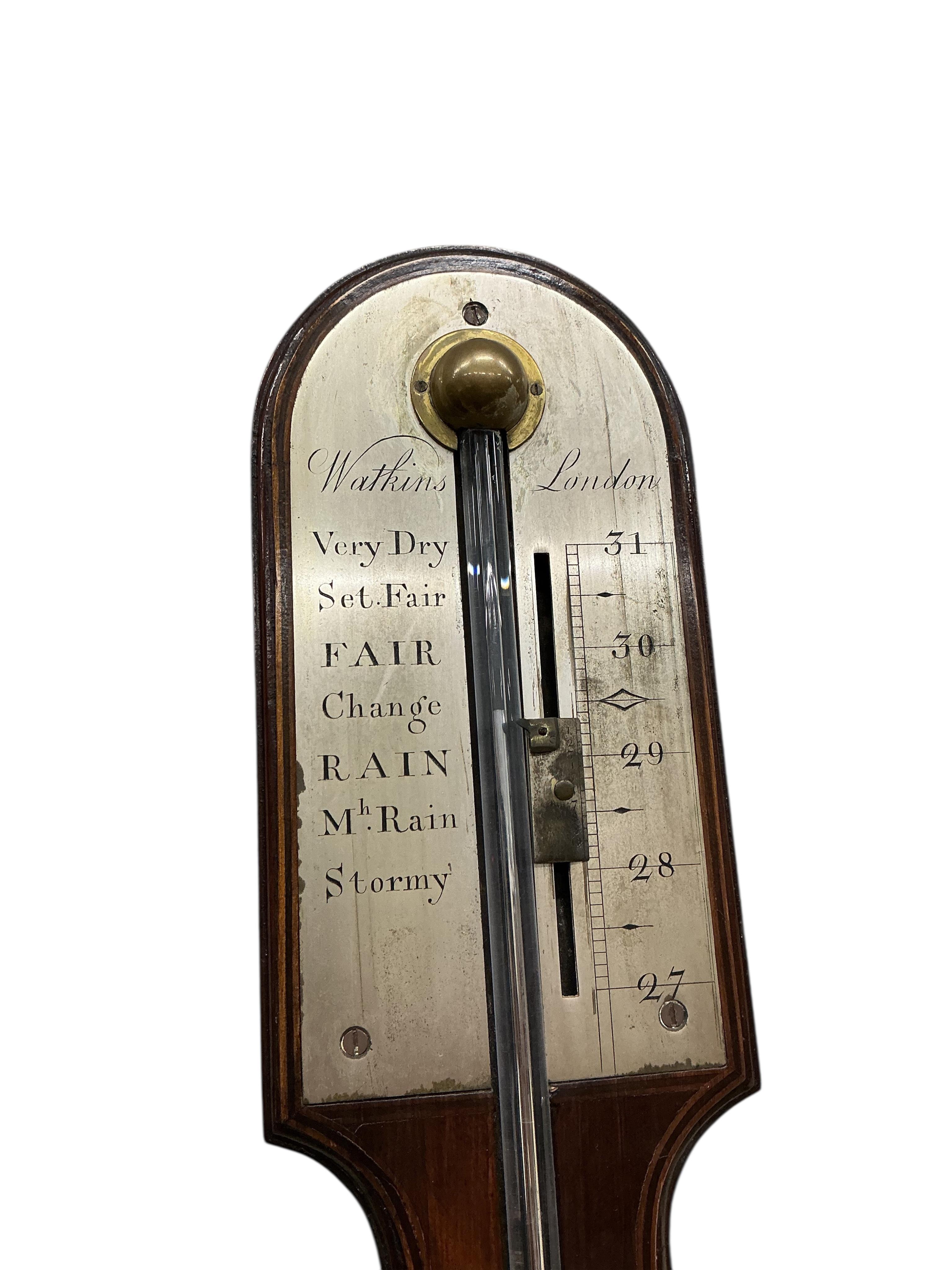 A George III mahogany stick barometer, silver dial marked Watkins, London, height 95cm